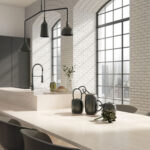 Caesarstone ICON 4023 Topus Concrete grey surface in modern industrial kitchen