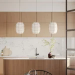 Caesarstone ICON 5105 Calacatta Dreamwave white veined surface in modern farmhouse kitchen
