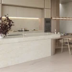 Caesarstone ICON 8251 Taj Whisper Kitchen with modern kitchen with marble island, wooden dining table, abstract wall art, and minimalist decor.