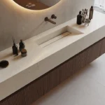 Caesarstone ICON 8252 Sedara in Modern bathroom sink with integrated basin, wooden vanity, round mirror, and grooming accessories.